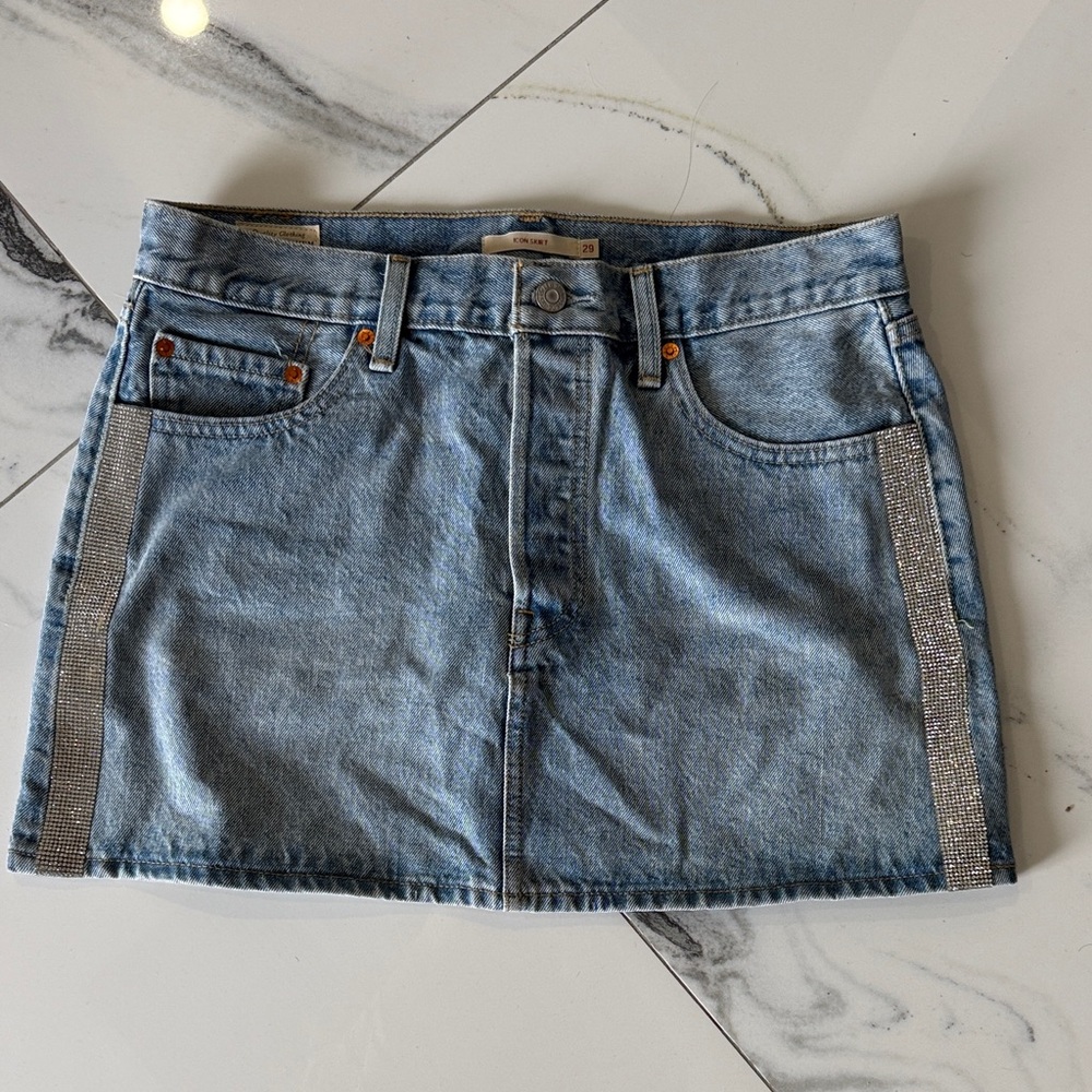 Denim Levi's miniskirt with bling details
